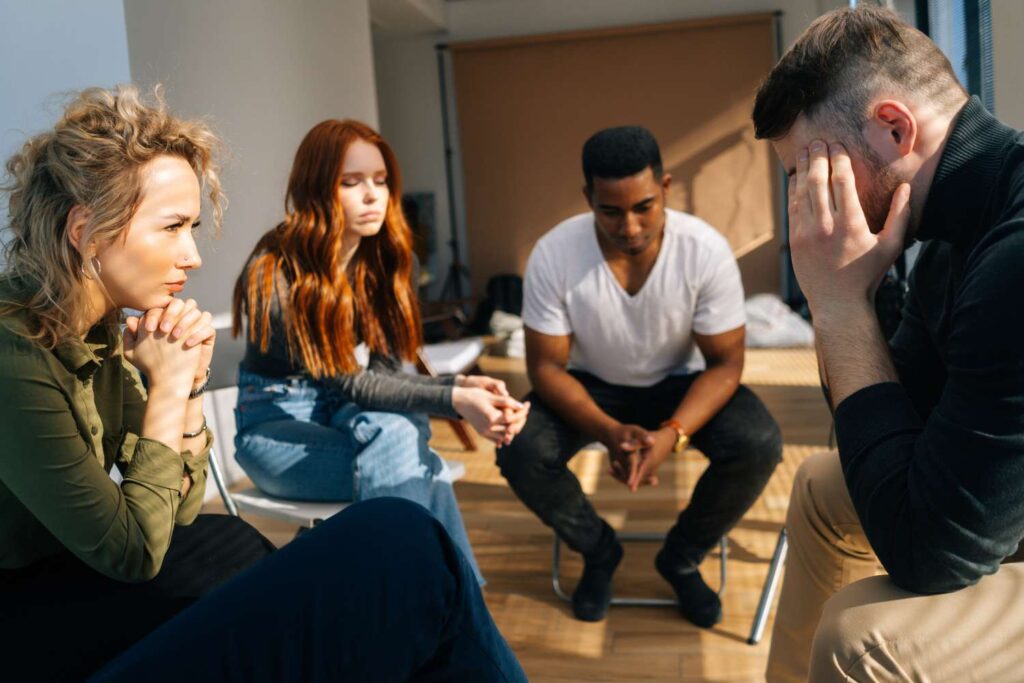 Therapist conduction interpersonal therapy with three patients