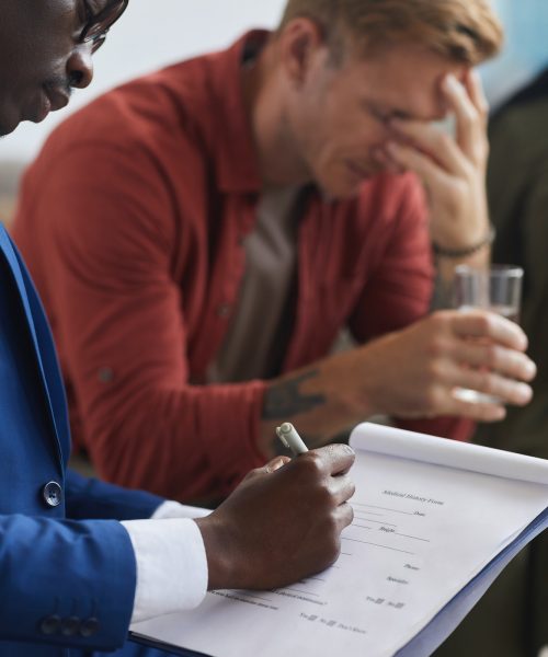 Man Crying in Therapy Session