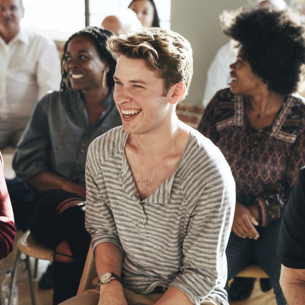 Young man enjoying a seminar